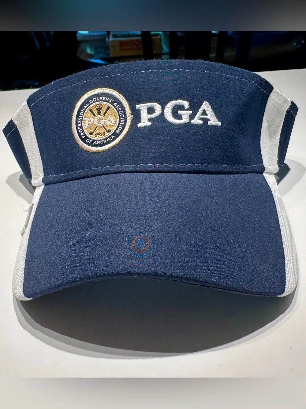 PGA Tour Navy and White Visor with Gold Logo